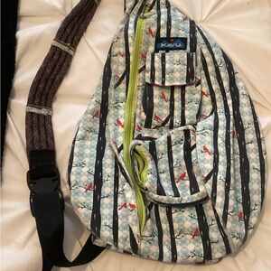 KAVU Sling Bag - Blue and Black redbird Cardinal